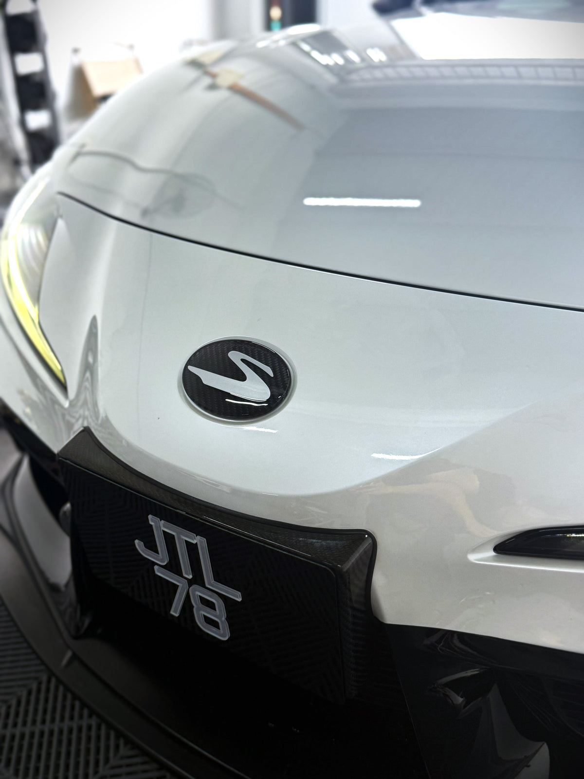 Supra "S" Silver Dry Carbon Emblem